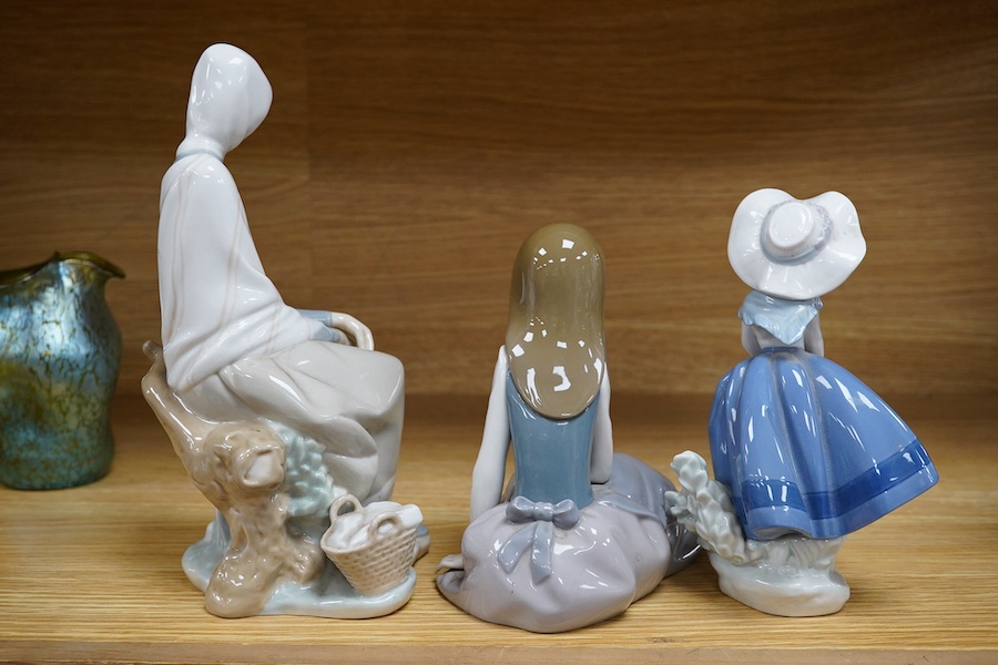 Three various Lladro figures, tallest 24cm. Condition - fair to good